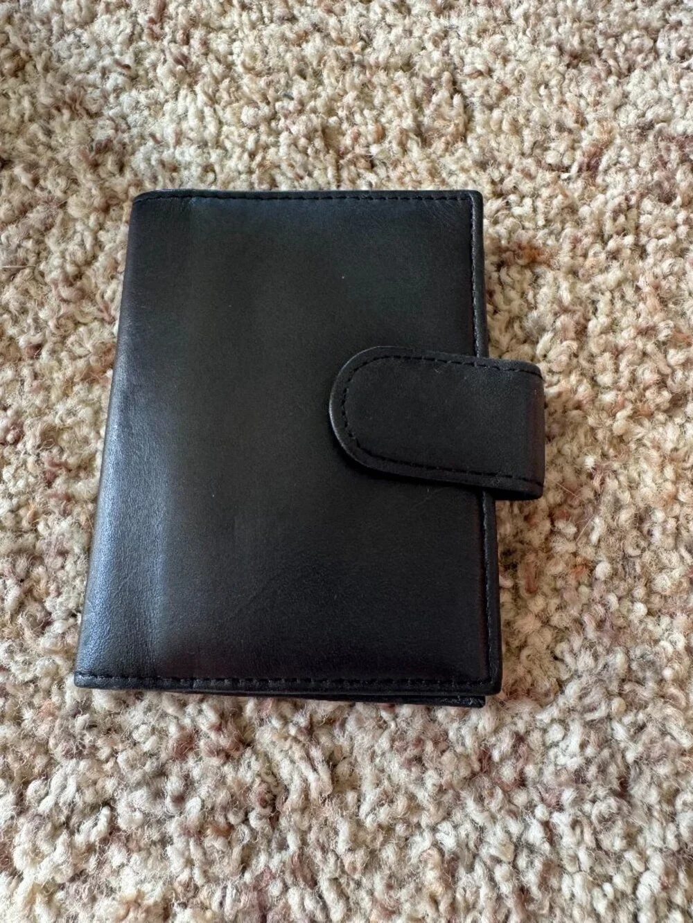 Vintage Buxton Compact Bifold Wallet in a classic solid black leather c